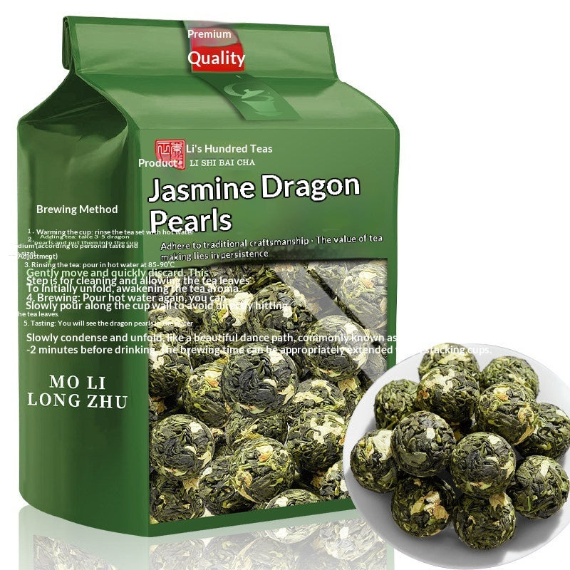 A green stand-up pouch of Mo Li Long Zhu Jasmine Dragon Pearls tea with a white plate of green tea pearls in the lower right corner, on a white background.