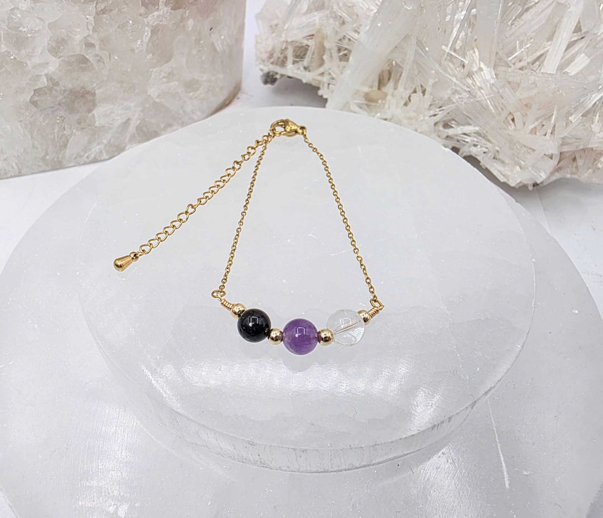 ESPACIO SAGRADO - Conjunto de joyas de cuarzo transparente, amatista y ónix negro
