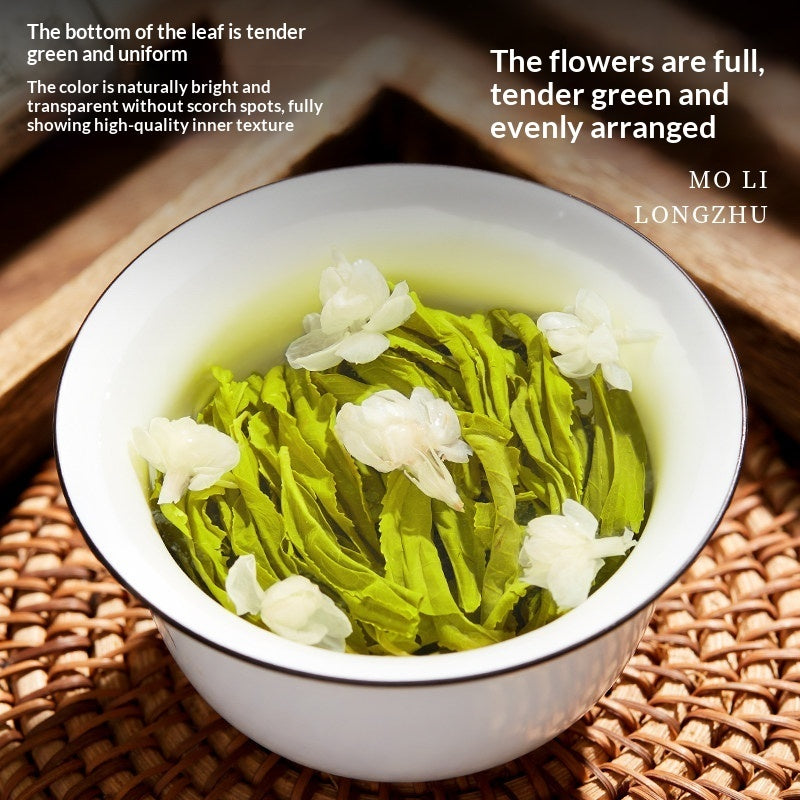 A white ceramic bowl filled with brewed green tea leaves and white flowers, placed on a woven mat. Text overlays describe the tea's color and appearance, with the brand name MO LI LONGZHU visible on the right.