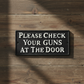 "Please Check Your Guns at the Door" Cast Iron Saloon Sign