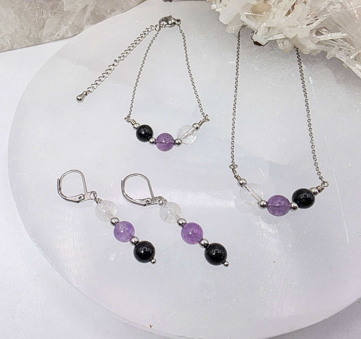 ESPACIO SAGRADO - Conjunto de joyas de cuarzo transparente, amatista y ónix negro