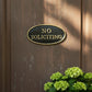 "No Soliciting" Oval Wall Sign, Cast Iron Black and Gold