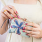 Enchanting Azure Embroidered Mini Pouch