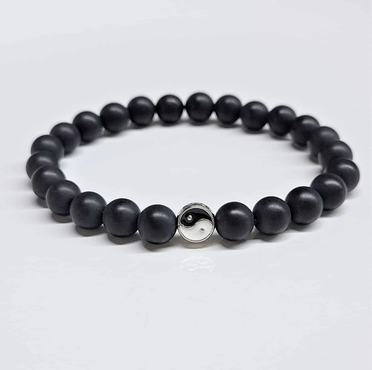 Pulsera de cuentas redondas lisas de lava Yin Yang de 8 mm - Protección equilibrada