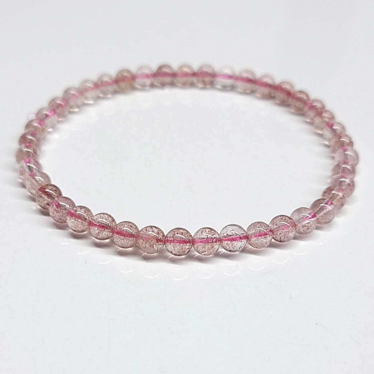 Pulsera de cuentas redondas de cuarzo fresa - Magnetismo de alma gemela