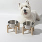 Stainless Steel Cat Bowl On A Raised Wooden Stand To Prevent Tipping